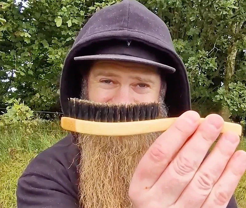 Brushing a full beard with the Braw Beard Brush outdoors in Scotland